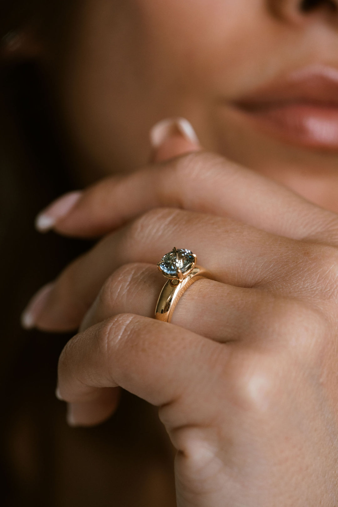 Oval Teal Sapphire East-West Arc Ring