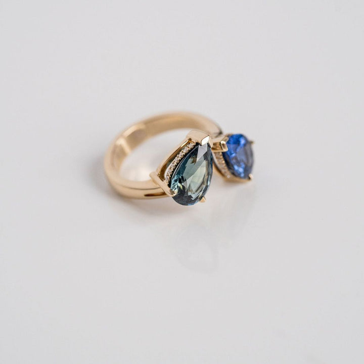 Pear Shape Blue & Teal Sapphire Toi et Moi Gap Ring With Diamond Collar