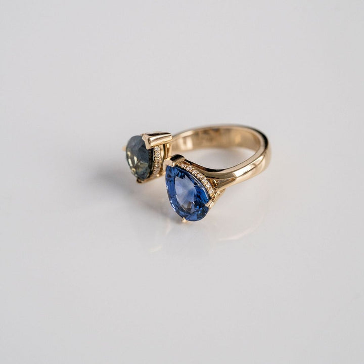 Pear Shape Blue & Teal Sapphire Toi et Moi Gap Ring With Diamond Collar