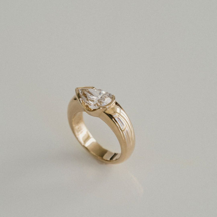 Pear Shape Diamond East-West Half Bezel Haven Ring Narrow