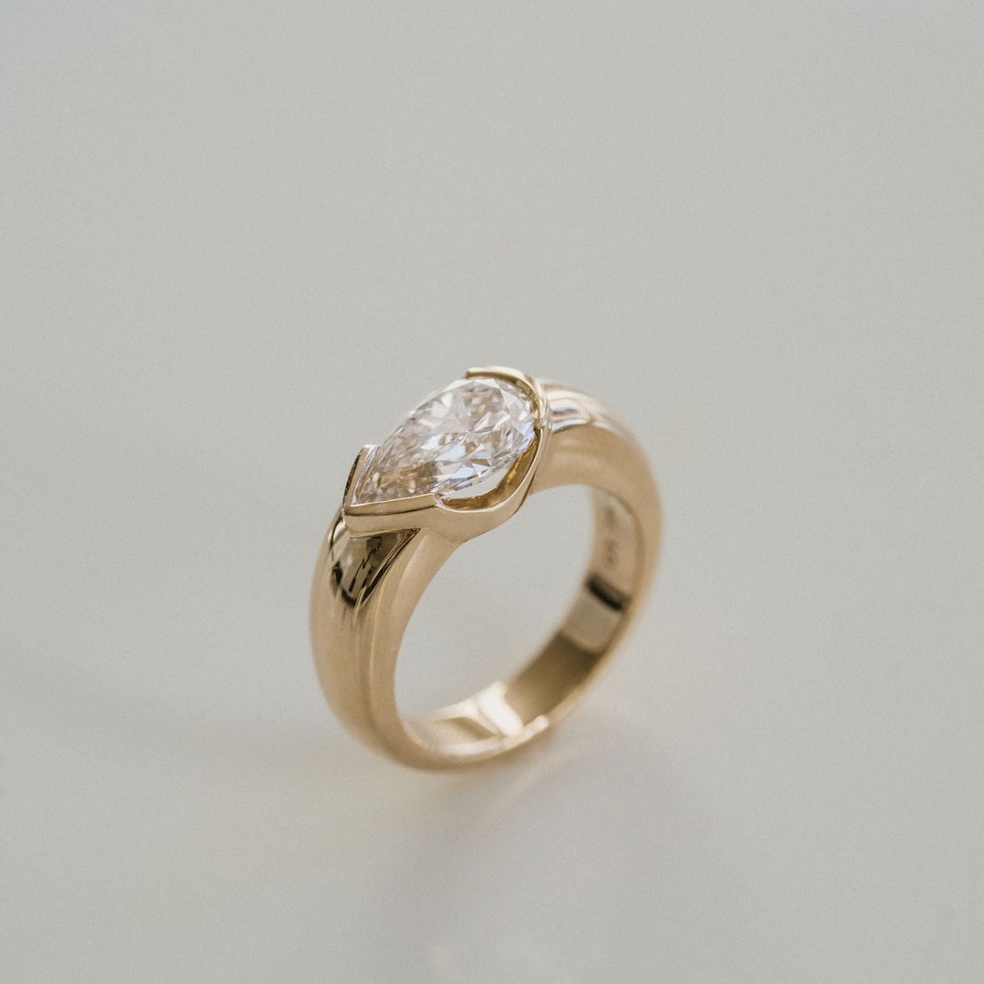 Pear Shape Diamond East-West Half Bezel Haven Ring Narrow