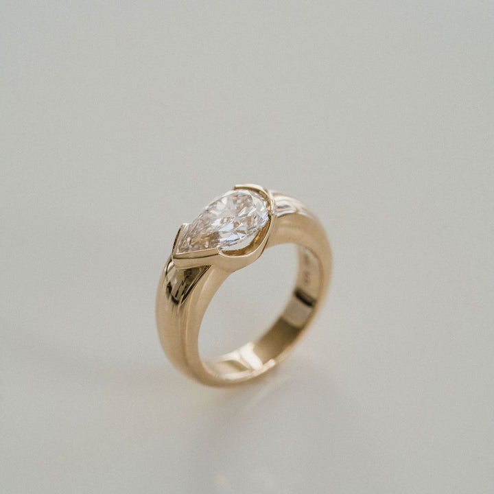 Pear Shape Diamond East-West Half Bezel Haven Ring Narrow