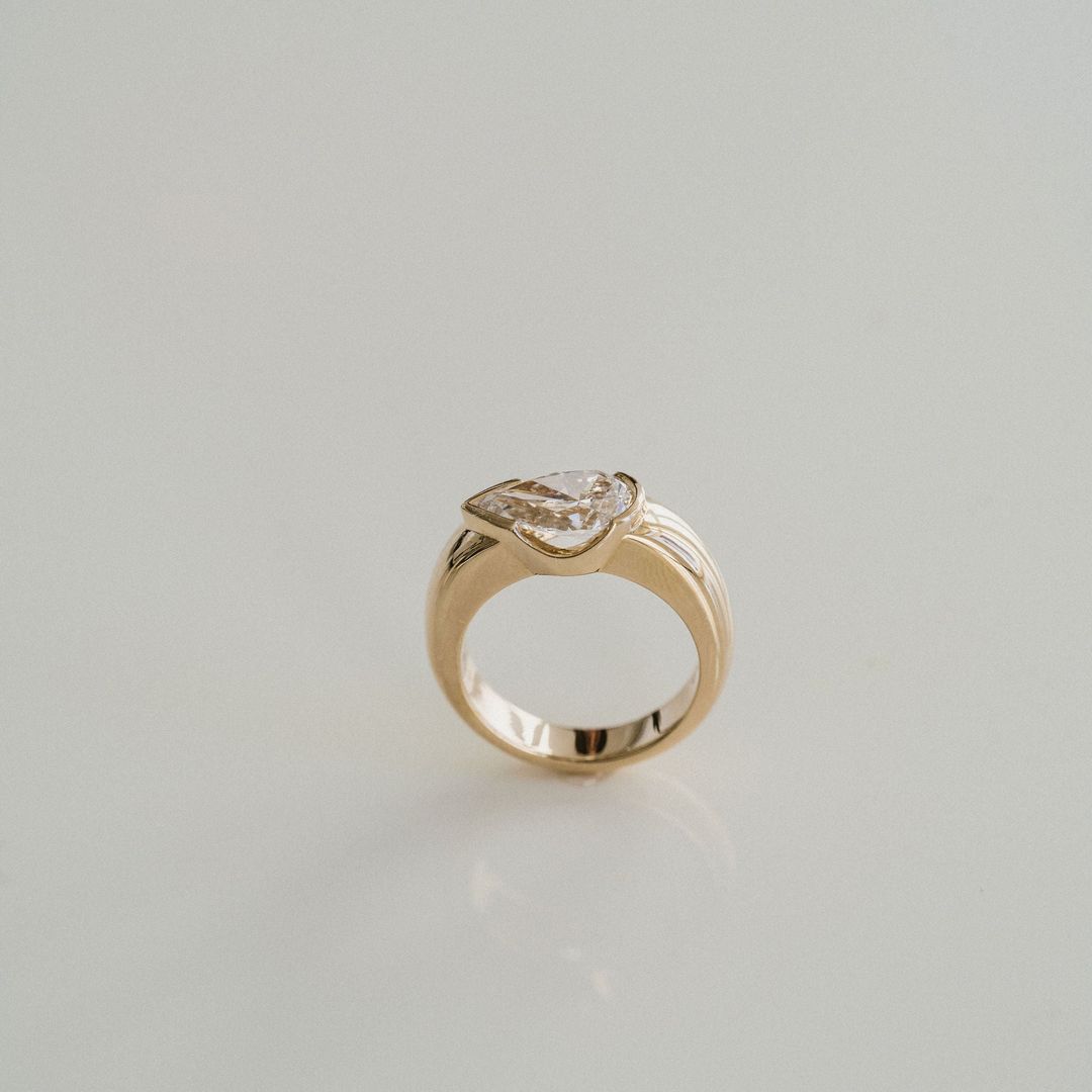 Pear Shape Diamond East-West Half Bezel Haven Ring Narrow