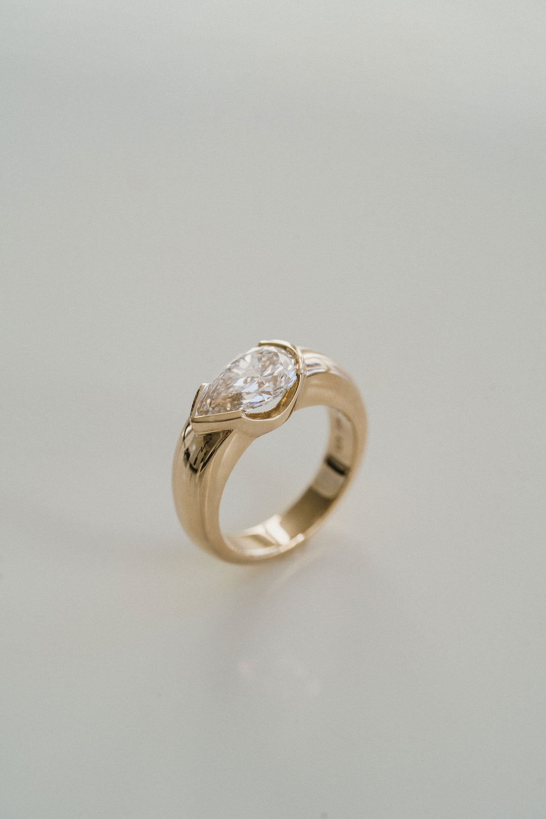 Pear Shape Diamond East-West Half Bezel Haven Ring Narrow