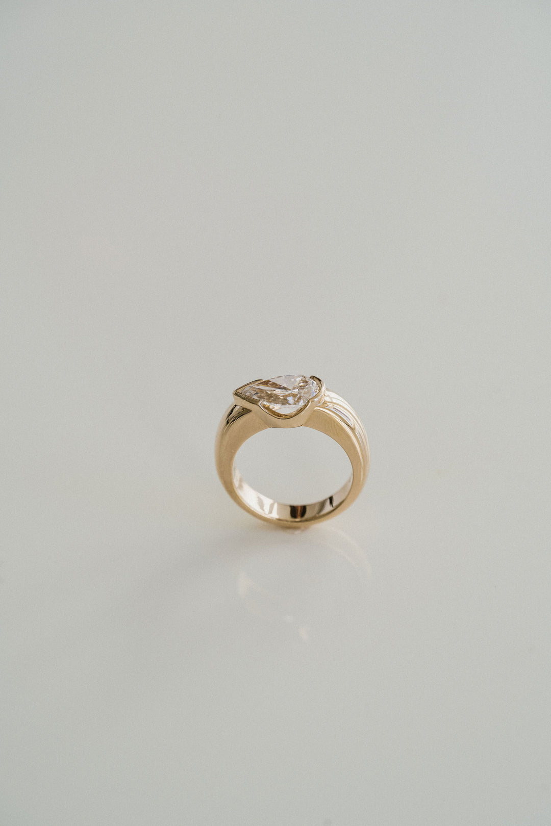 Pear Shape Diamond East-West Half Bezel Haven Ring Narrow