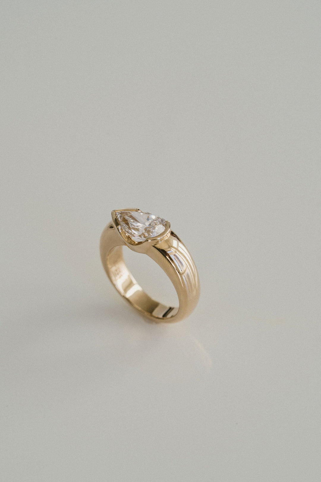 Pear Shape Diamond East-West Half Bezel Haven Ring Narrow