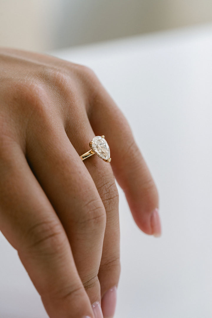 Pear Shape Diamond Solitaire With Collar