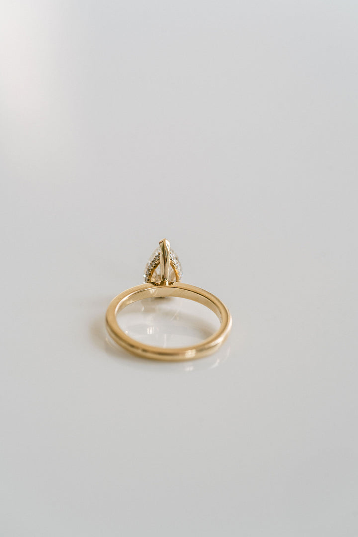 Pear Shape Diamond Solitaire With Collar