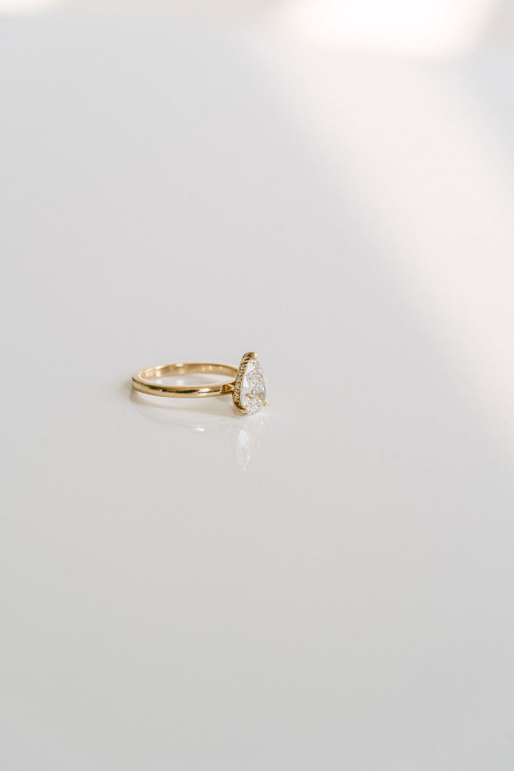 Pear Shape Diamond Solitaire With Collar