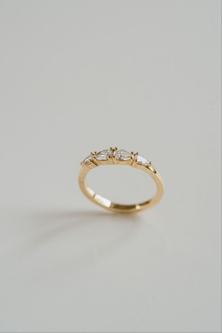 Pear Shape East-West Diamond Band
