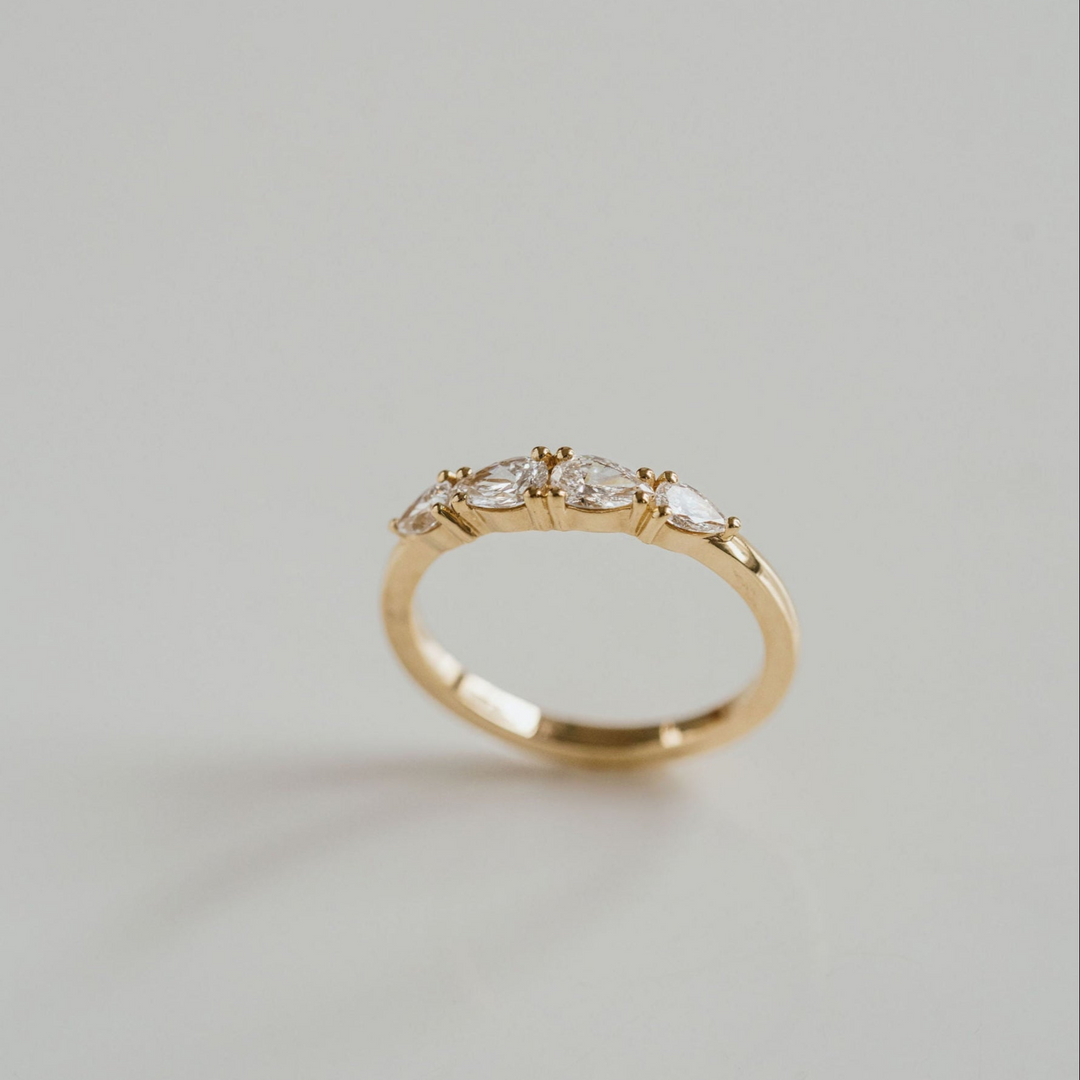 Pear Shape East-West Diamond Band