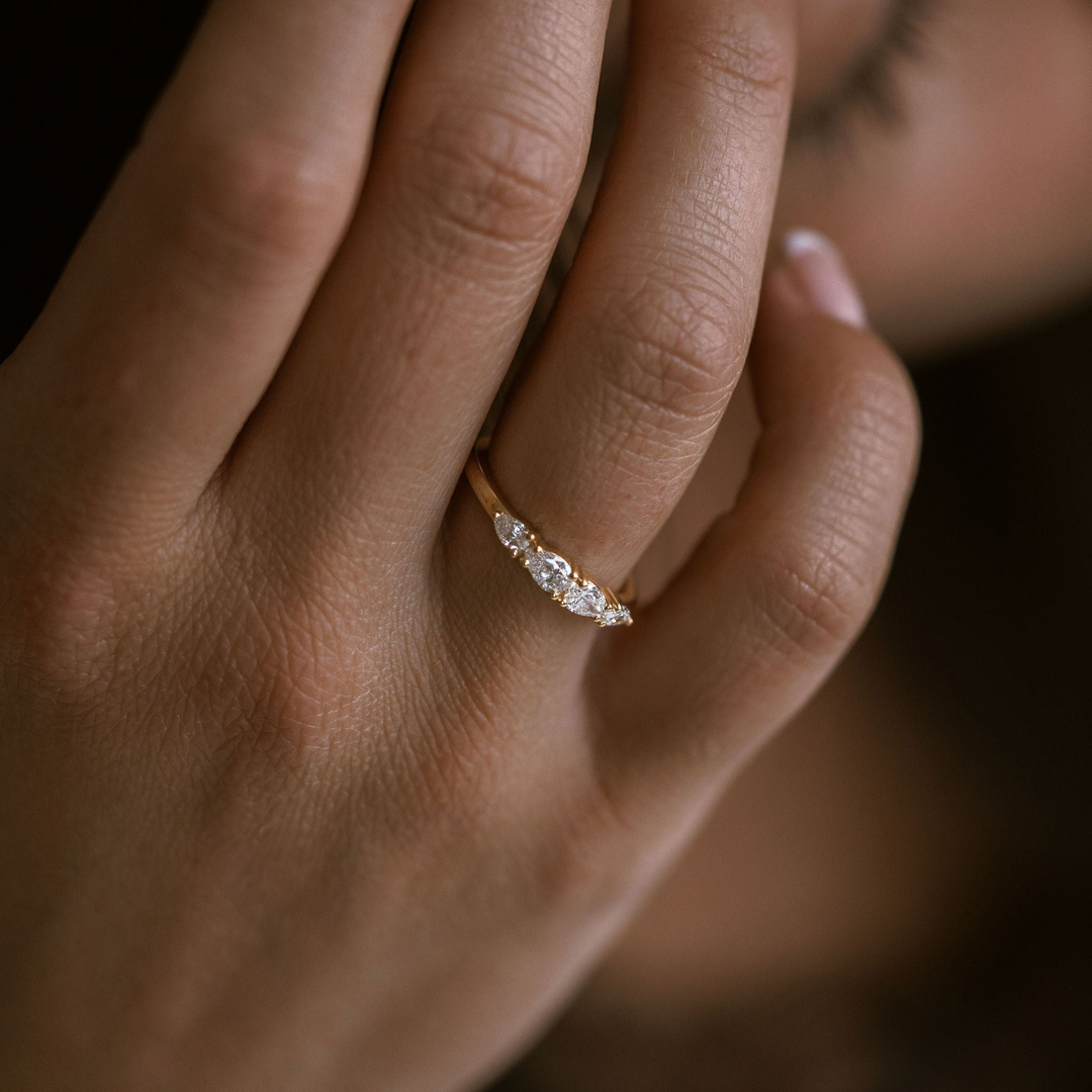 Pear Shape East-West Diamond Band