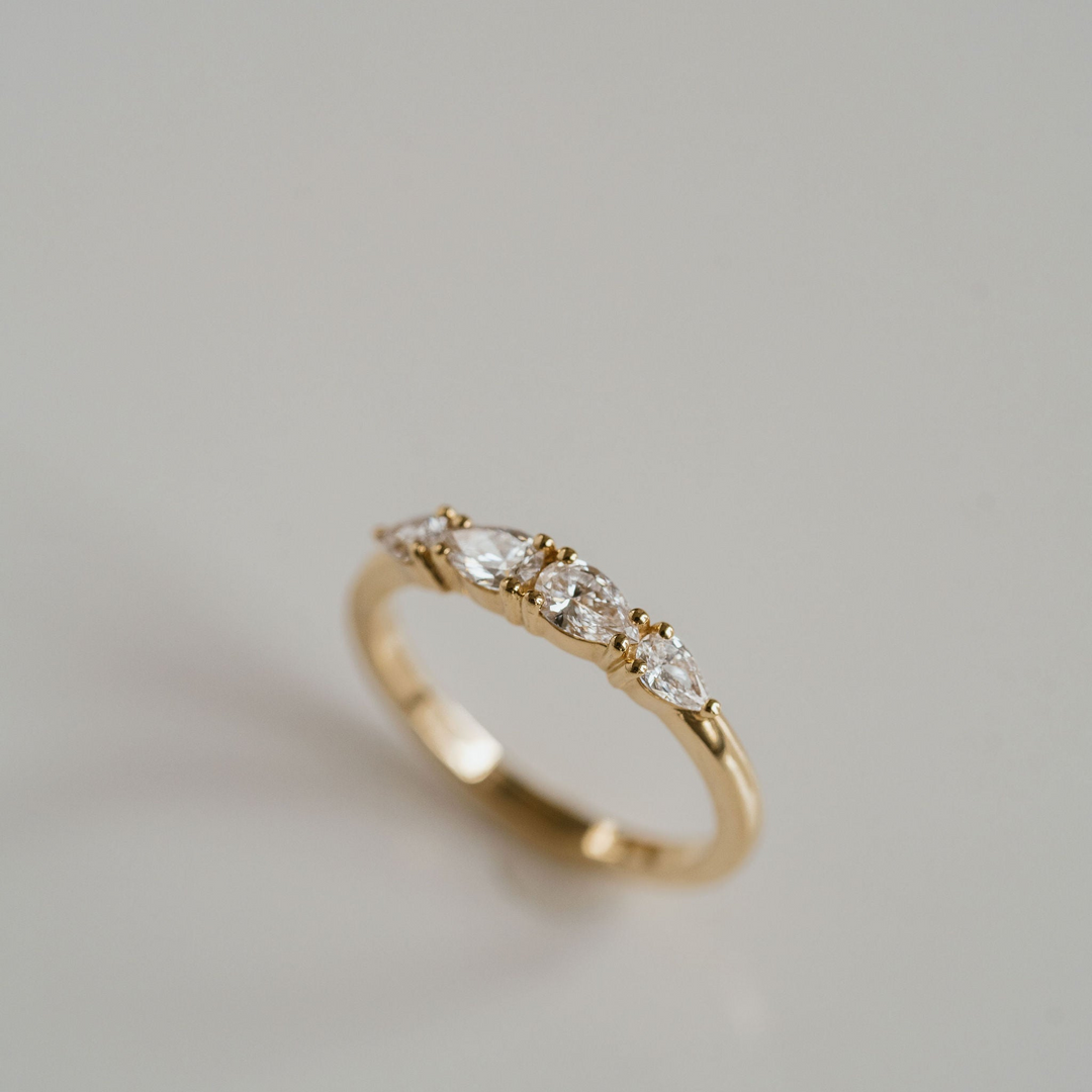 Pear Shape East-West Diamond Band