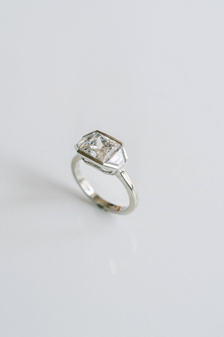 Princess Cut Diamond Monochrome Ring With Trapezoid Accents