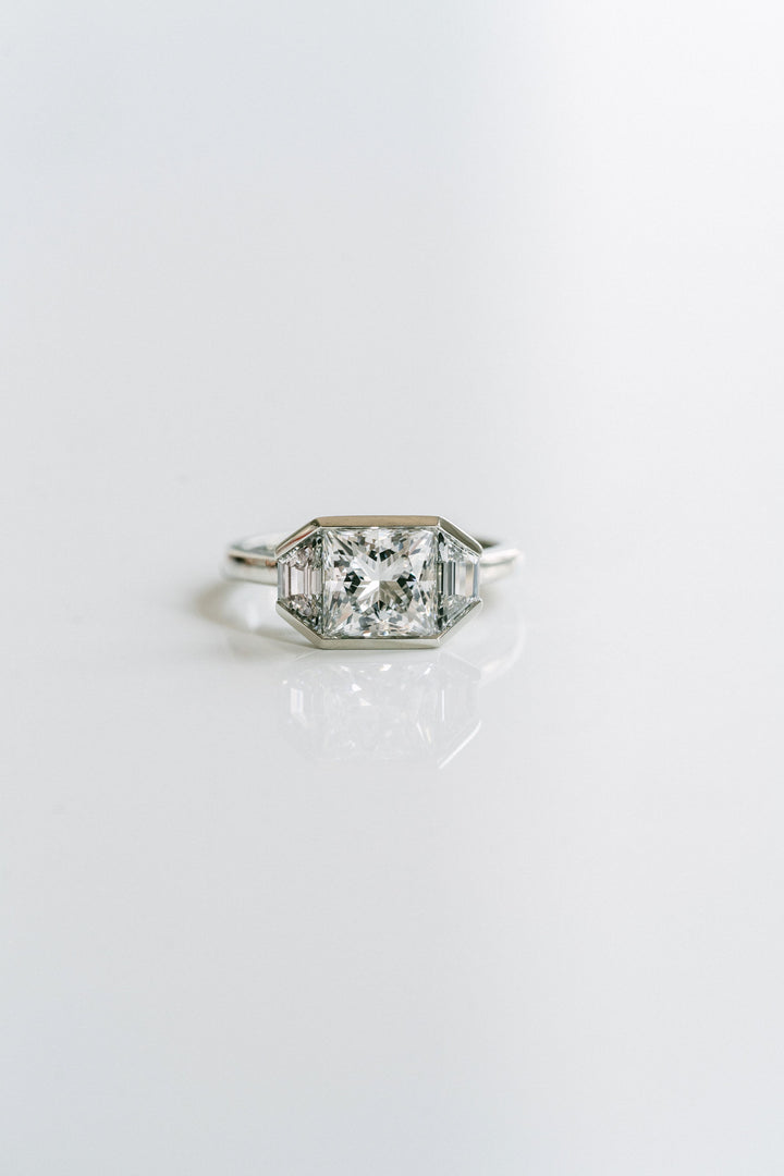 Princess Cut Diamond Monochrome Ring With Trapezoid Accents