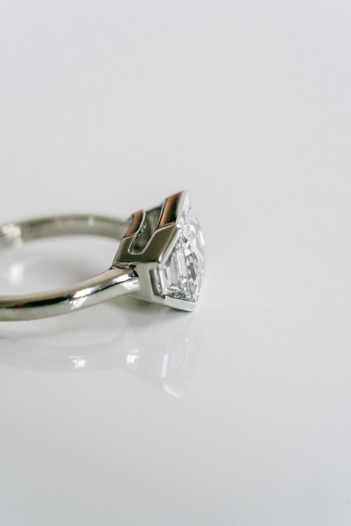 Princess Cut Diamond Monochrome Ring With Trapezoid Accents