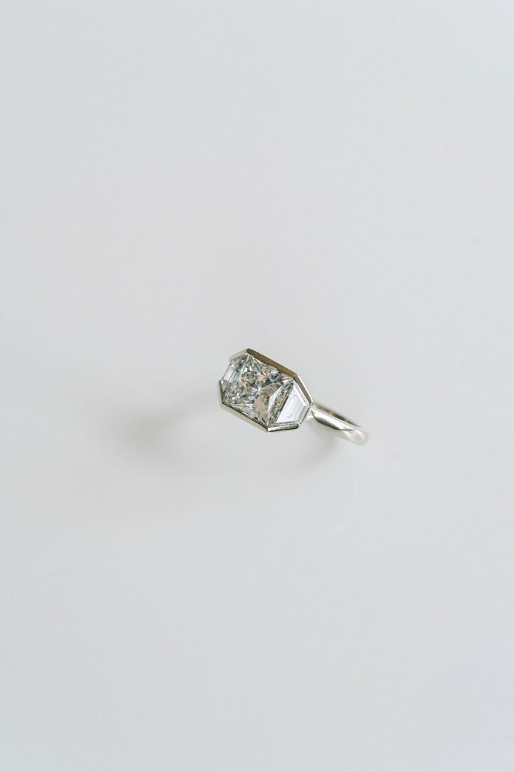 Princess Cut Diamond Monochrome Ring With Trapezoid Accents