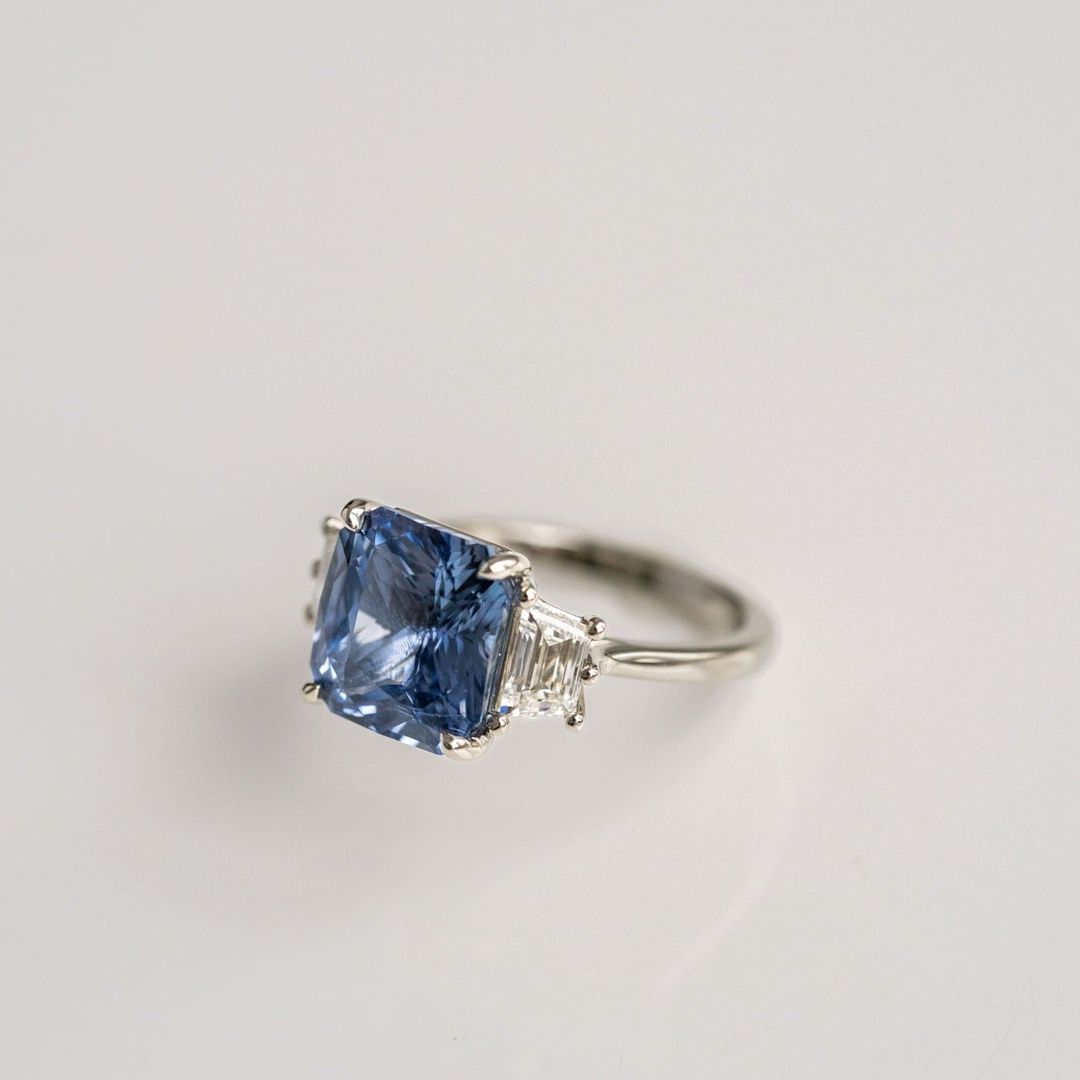 Radiant Cut Blue Sapphire With Trapezoid Diamond Accents