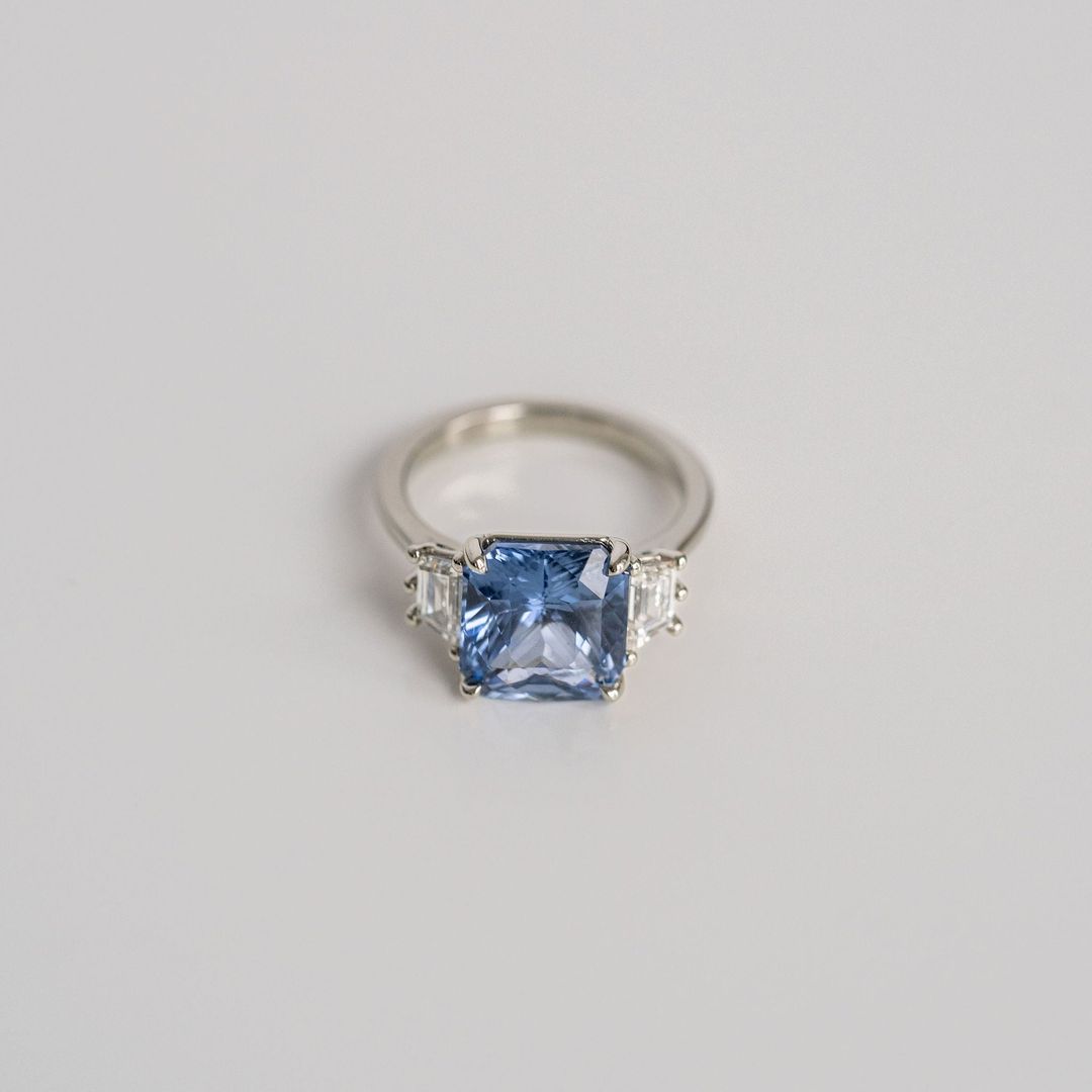 Radiant Cut Blue Sapphire With Trapezoid Diamond Accents