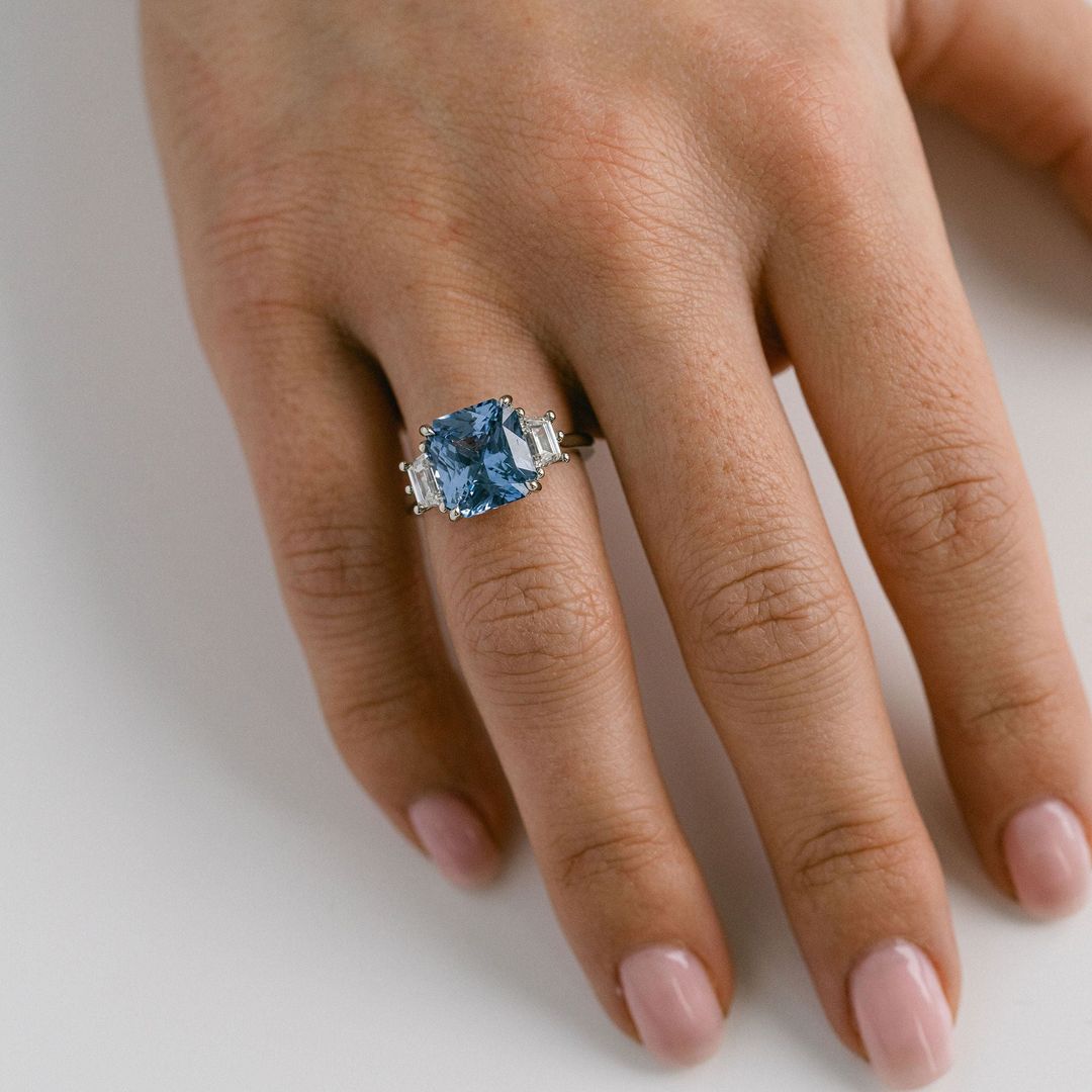 Radiant Cut Blue Sapphire With Trapezoid Diamond Accents