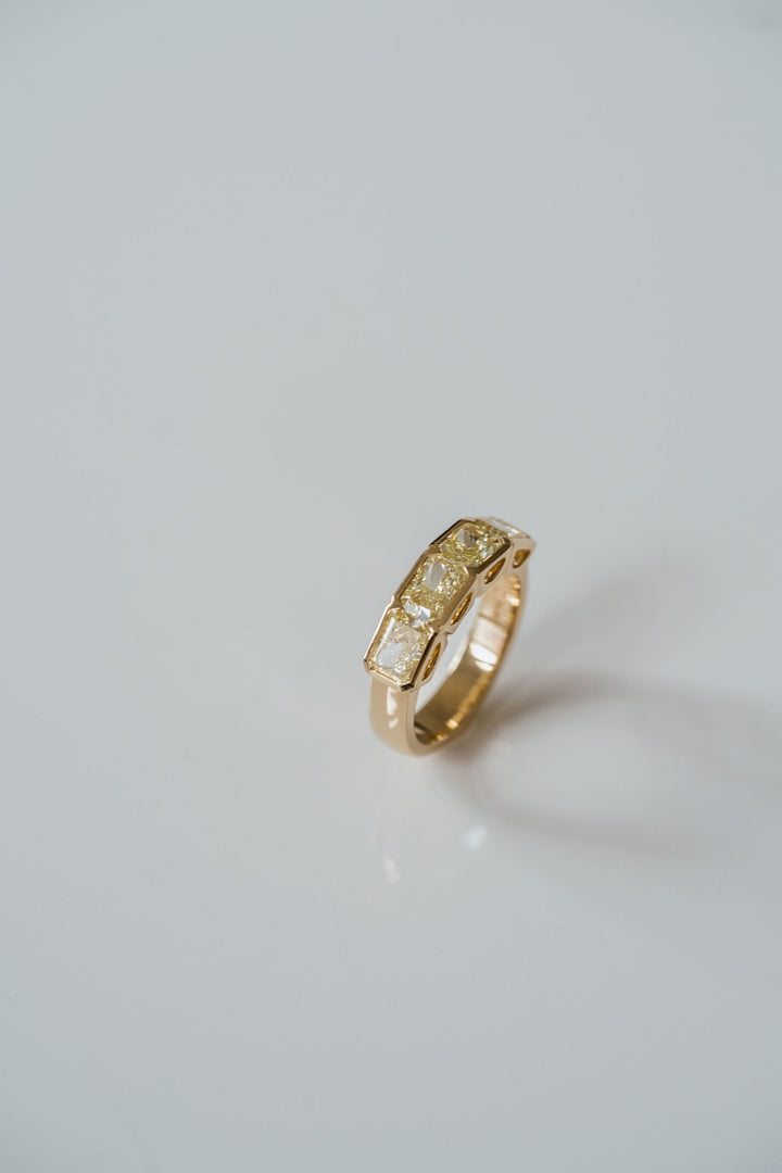 Radiant Cut East-West Yellow Diamond Bezel Band