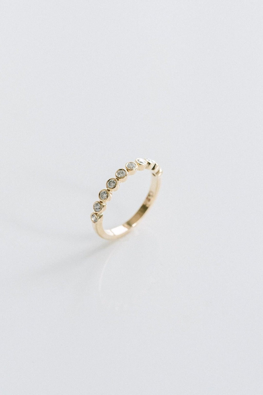Round Bezel Diamond Band