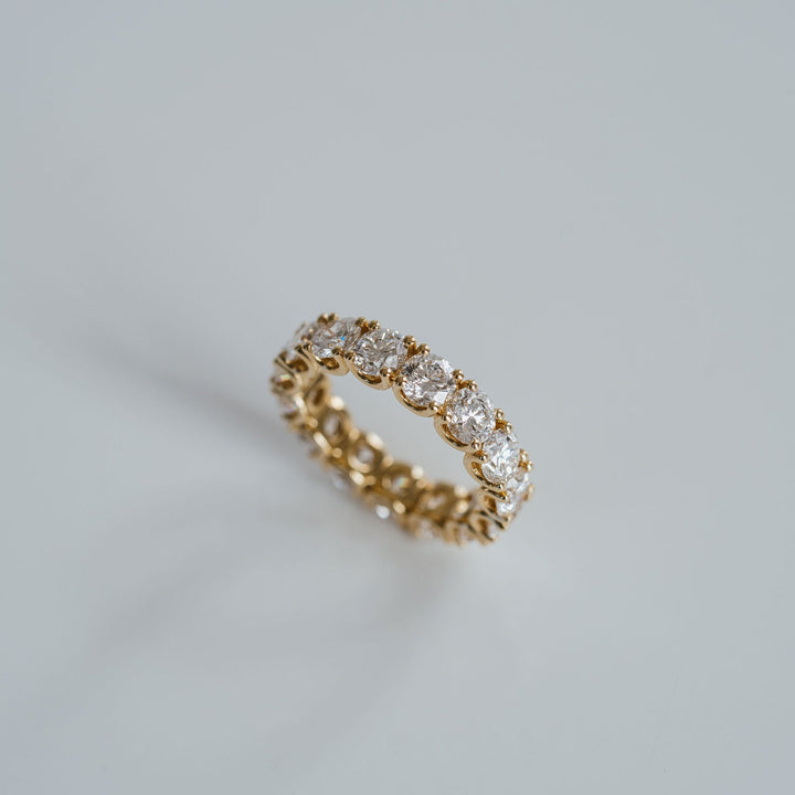 Round Brilliant Diamond Dahlia Eternity Band