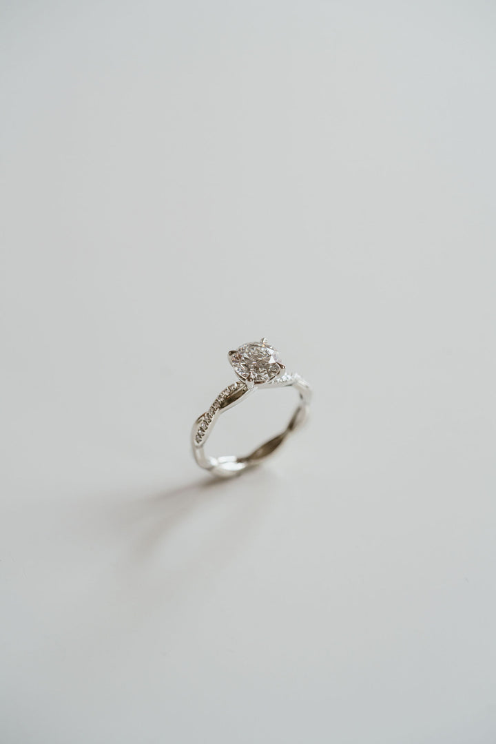 Round Brilliant Diamond Solitaire With Weave Band
