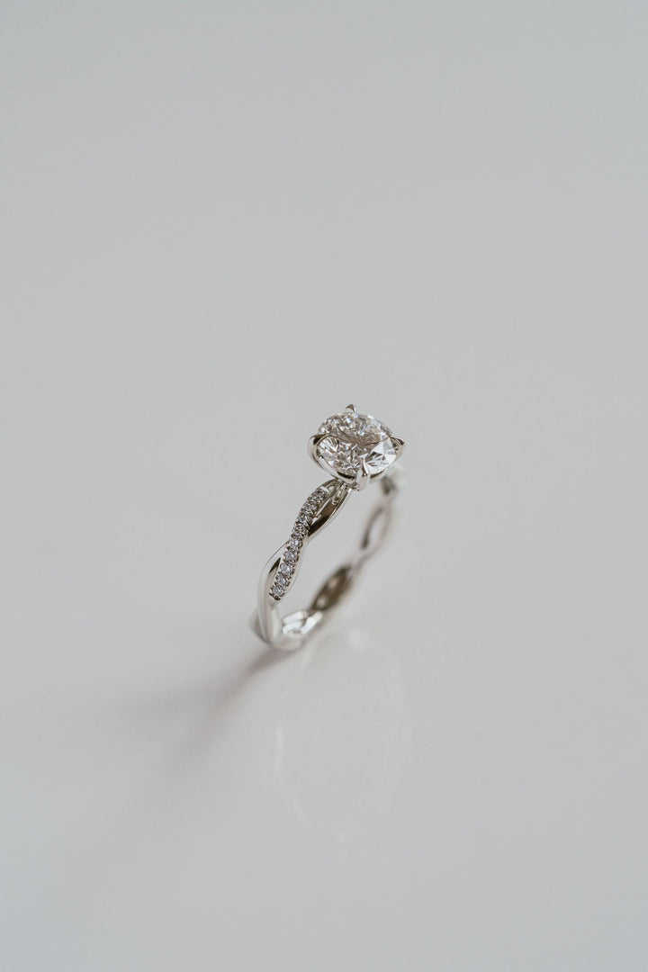 Round Brilliant Diamond Solitaire With Weave Band