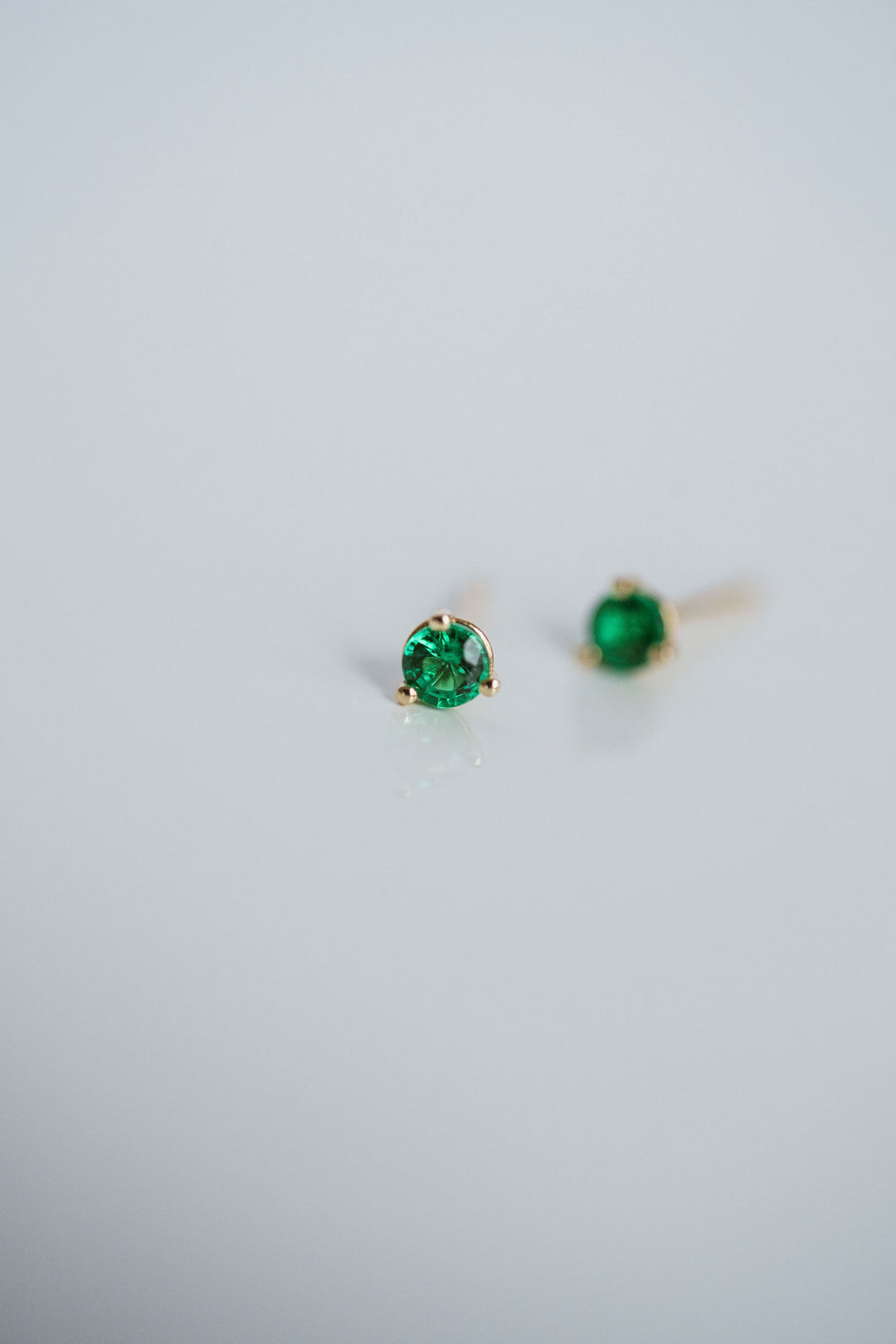 Round Emerald Studs