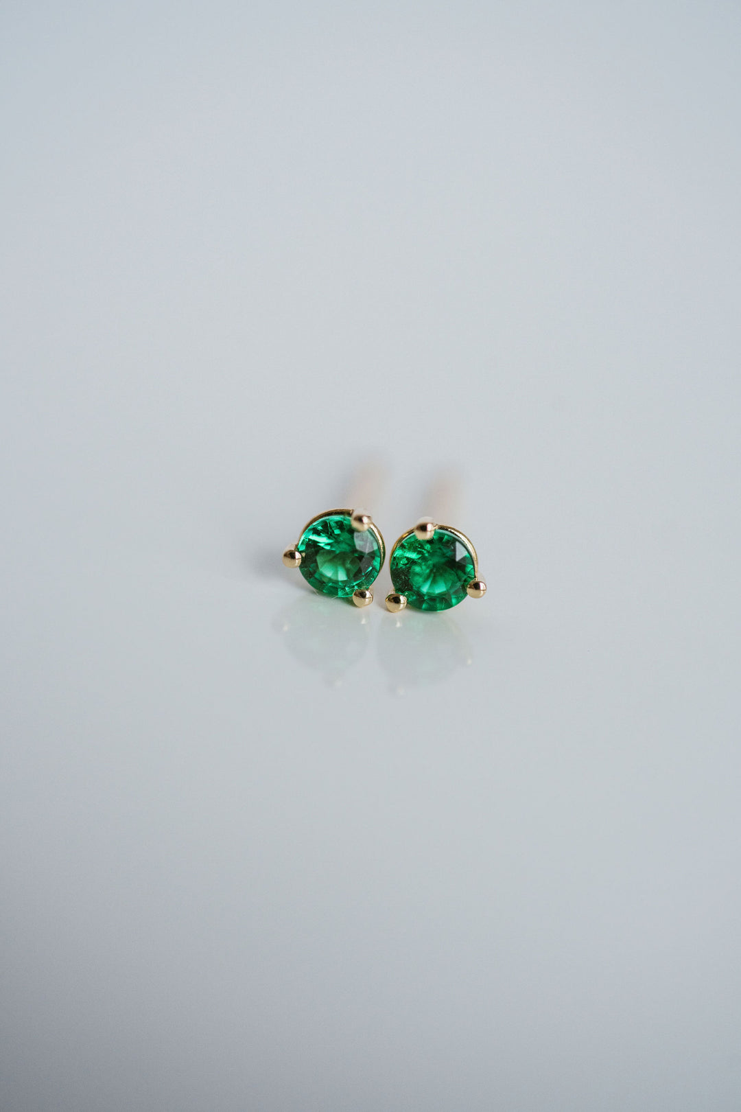 Round Emerald Studs