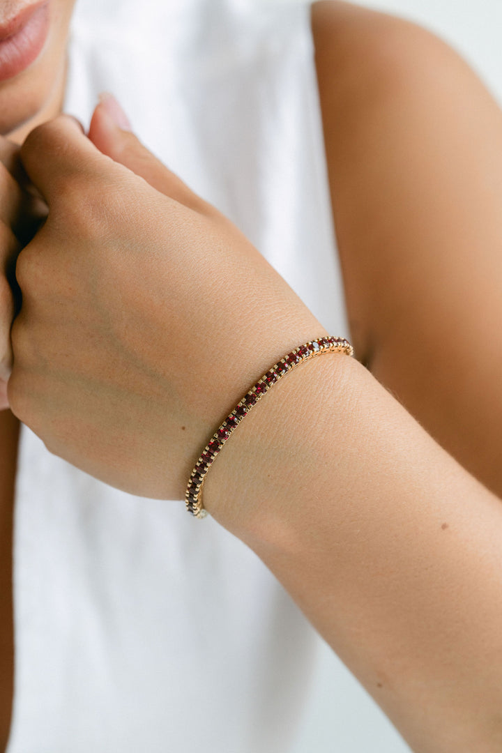 Round Ruby Tennis Bracelet With Flat Prongs