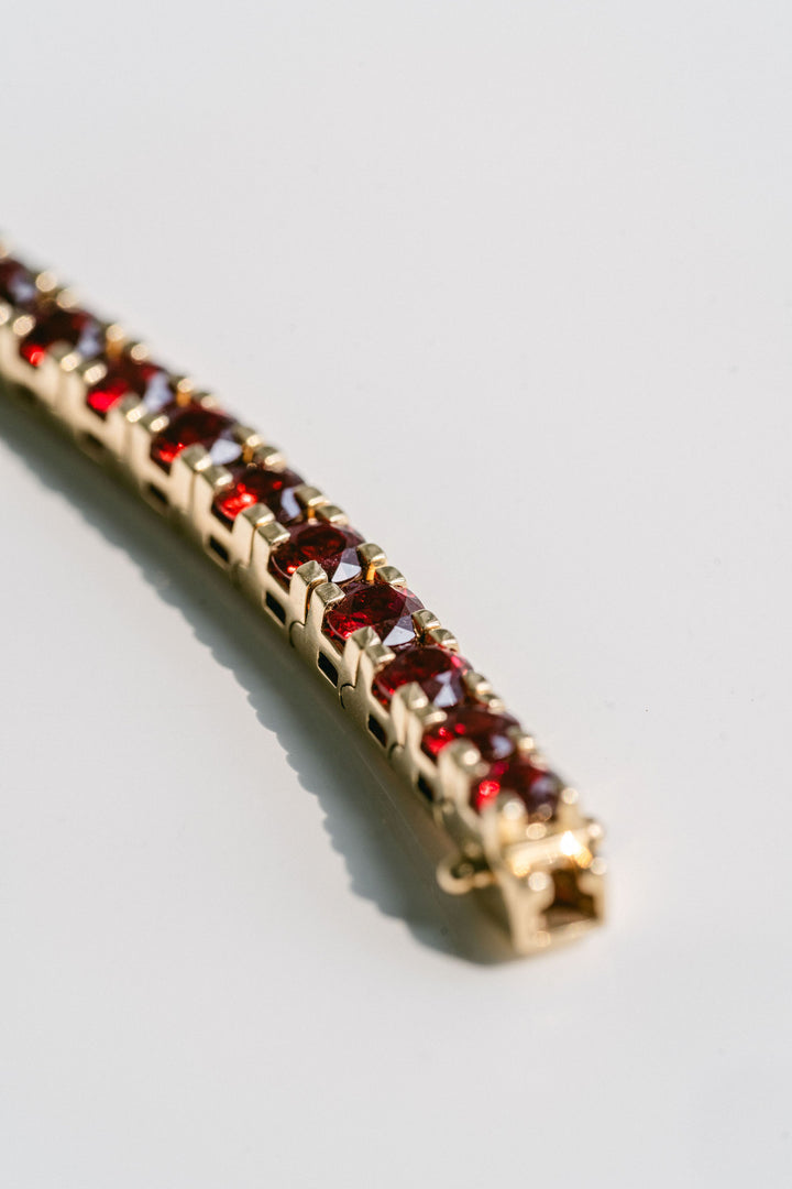 Round Ruby Tennis Bracelet With Flat Prongs