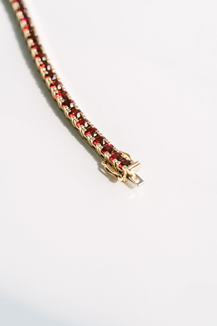 Round Ruby Tennis Bracelet With Flat Prongs