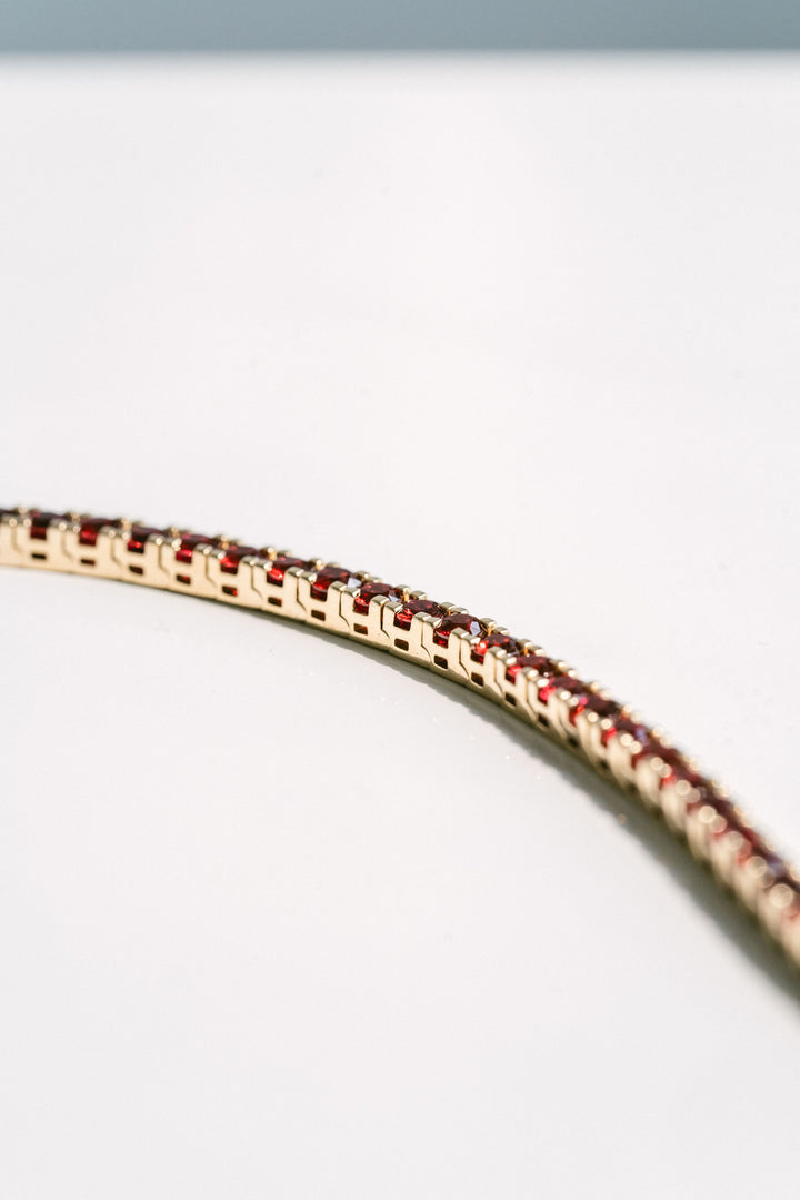 Round Ruby Tennis Bracelet With Flat Prongs