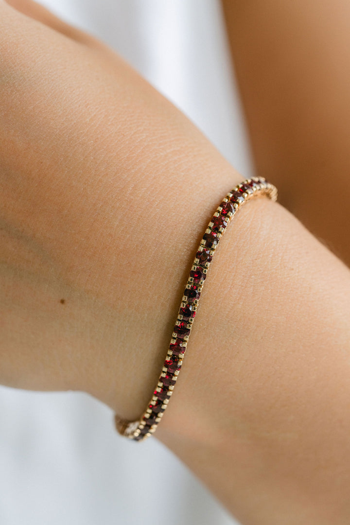 Round Ruby Tennis Bracelet With Flat Prongs