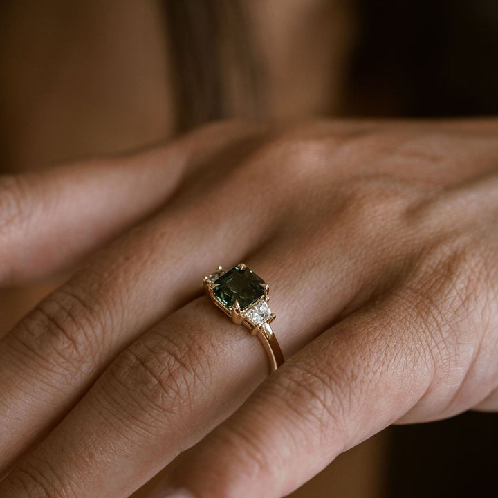 Square Emerald Cut Blue-Green Sapphire with Brilliant Trapezoid Diamond Accents