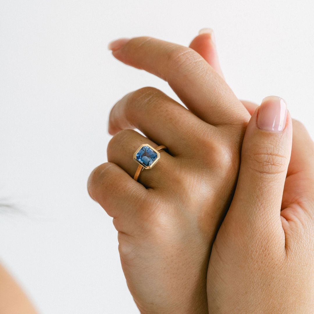 Square Emerald Cut Blue Sapphire Breeze Bezel Ring