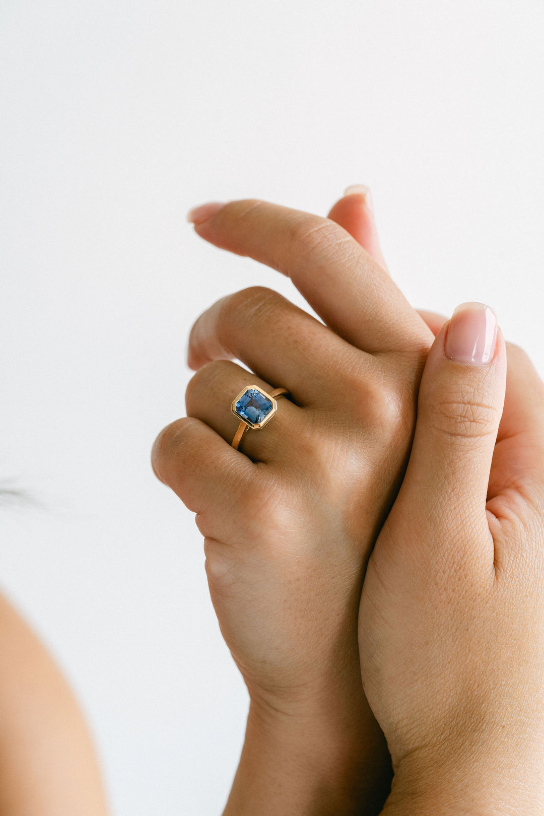Square Emerald Cut Blue Sapphire Breeze Bezel Ring