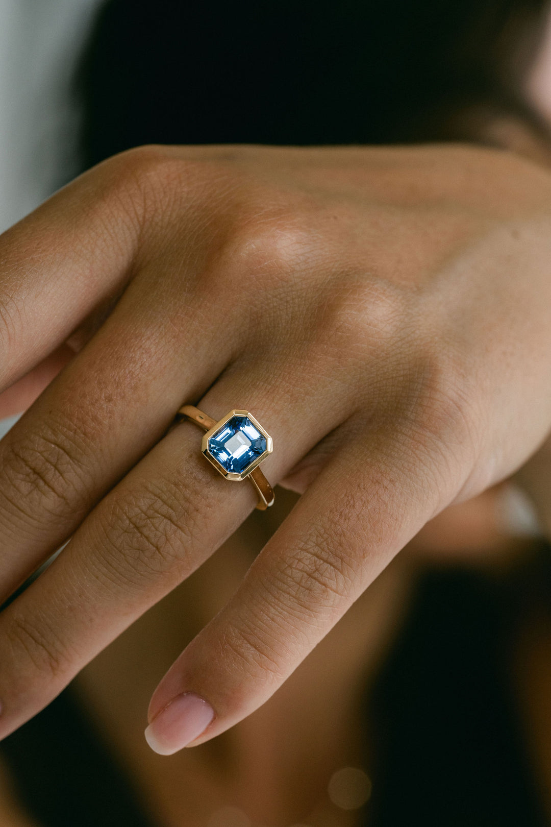 Square Emerald Cut Blue Sapphire Breeze Bezel Ring