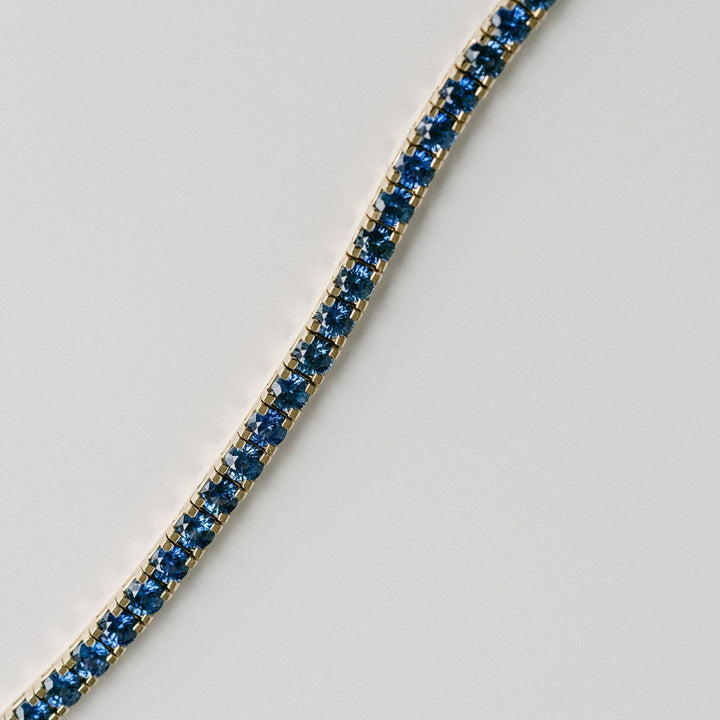 Round Blue Sapphire Tennis Bracelet With Flat Prongs
