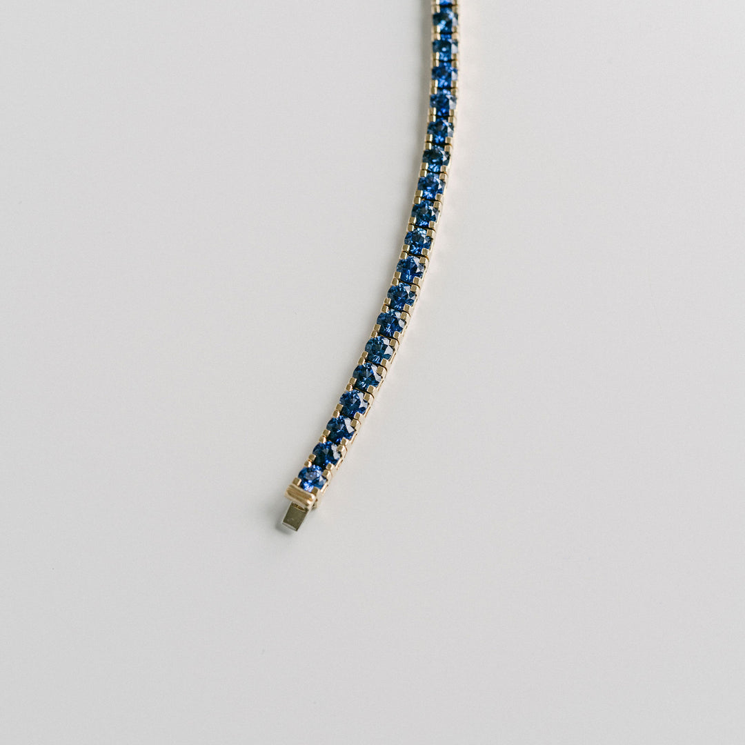 Round Blue Sapphire Tennis Bracelet With Flat Prongs