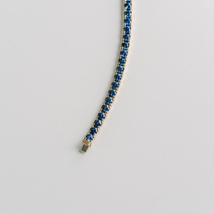 Round Blue Sapphire Tennis Bracelet With Flat Prongs