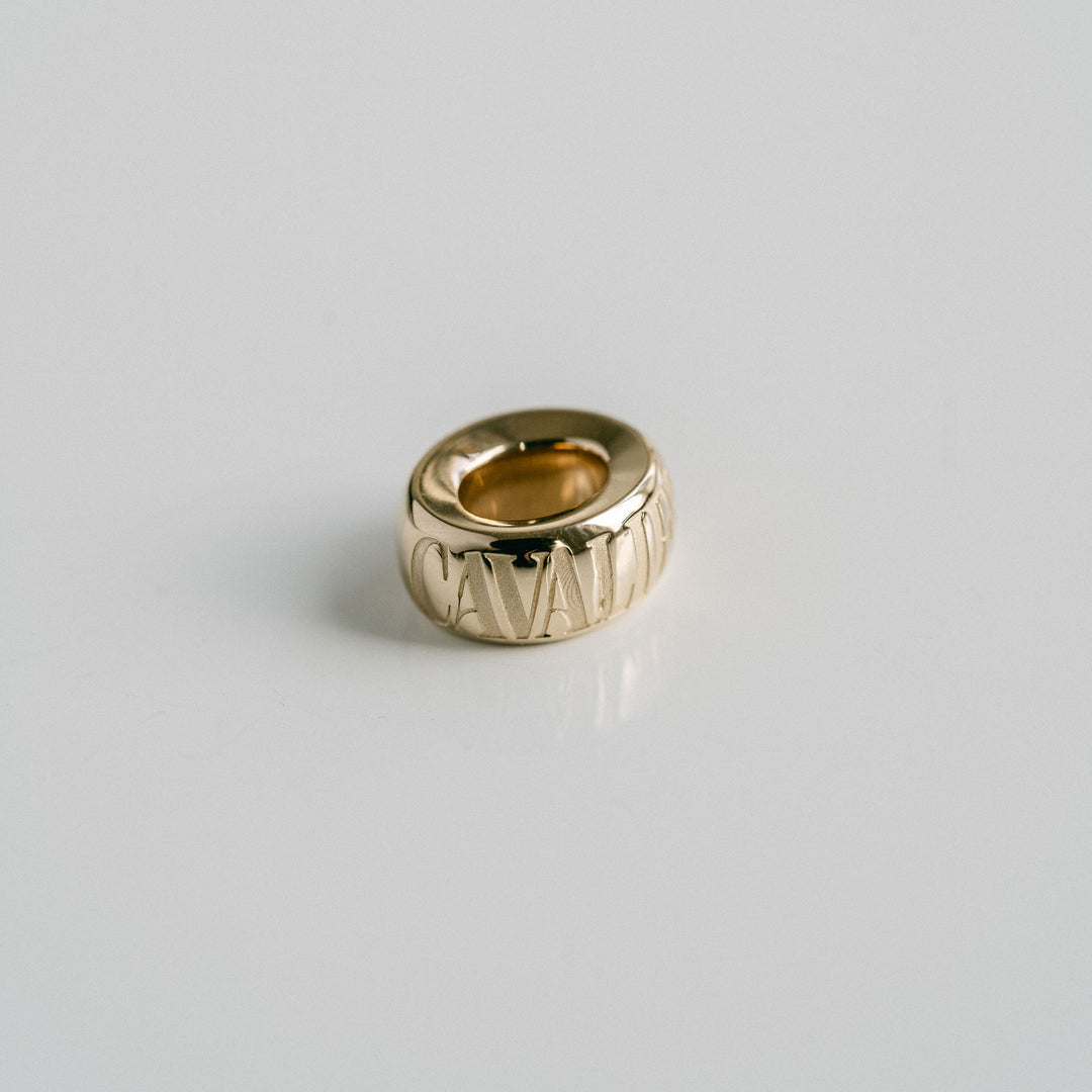 Cavalier Debossed Oval Torus Pendant