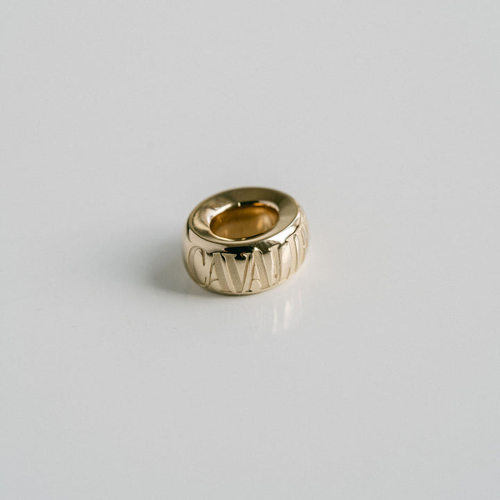 Cavalier Debossed Oval Torus Pendant