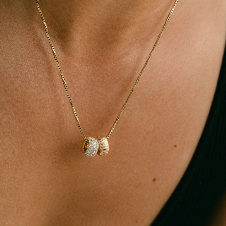 Cavalier Debossed Oval Torus Pendant