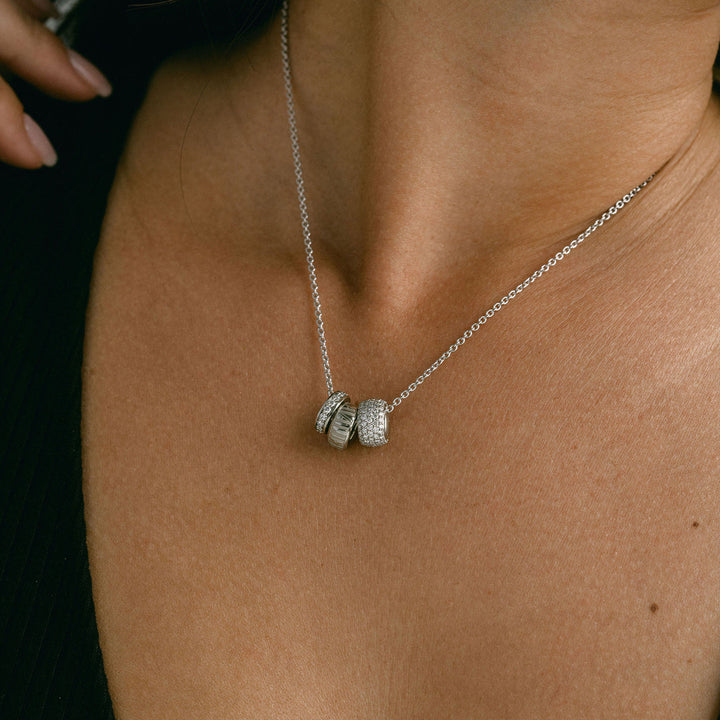 Cavalier Debossed Oval Torus Pendant