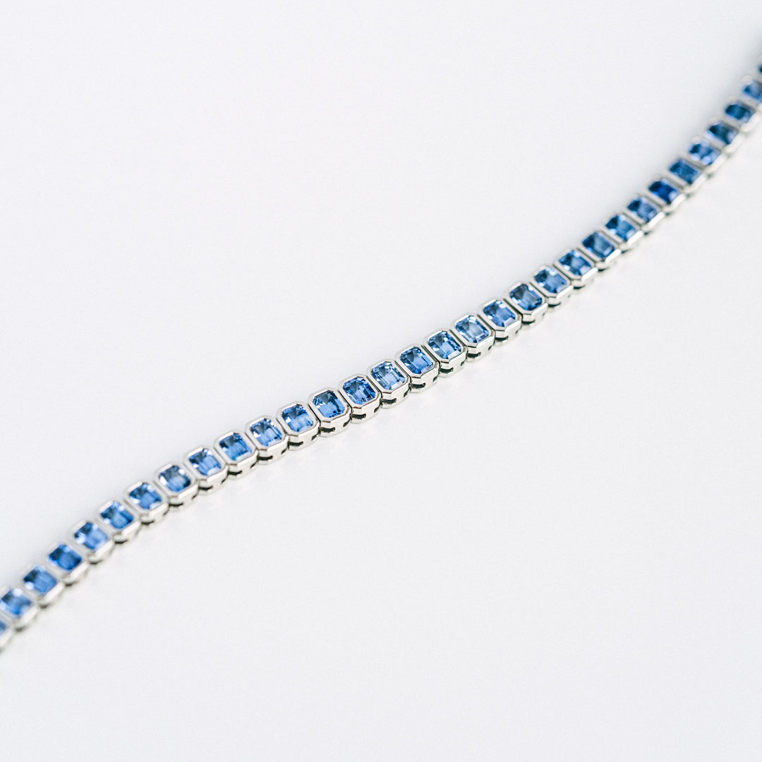 Emerald Cut Blue Sapphire Bezel Tennis Bracelet