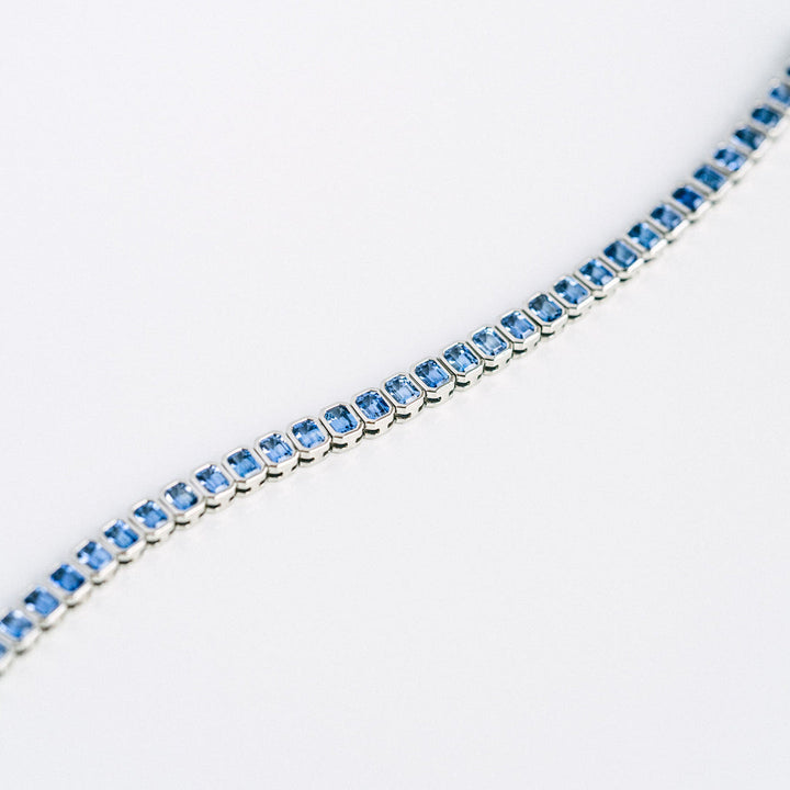 Emerald Cut Blue Sapphire Bezel Tennis Bracelet