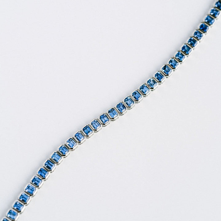 Emerald Cut Blue Sapphire Bezel Tennis Bracelet